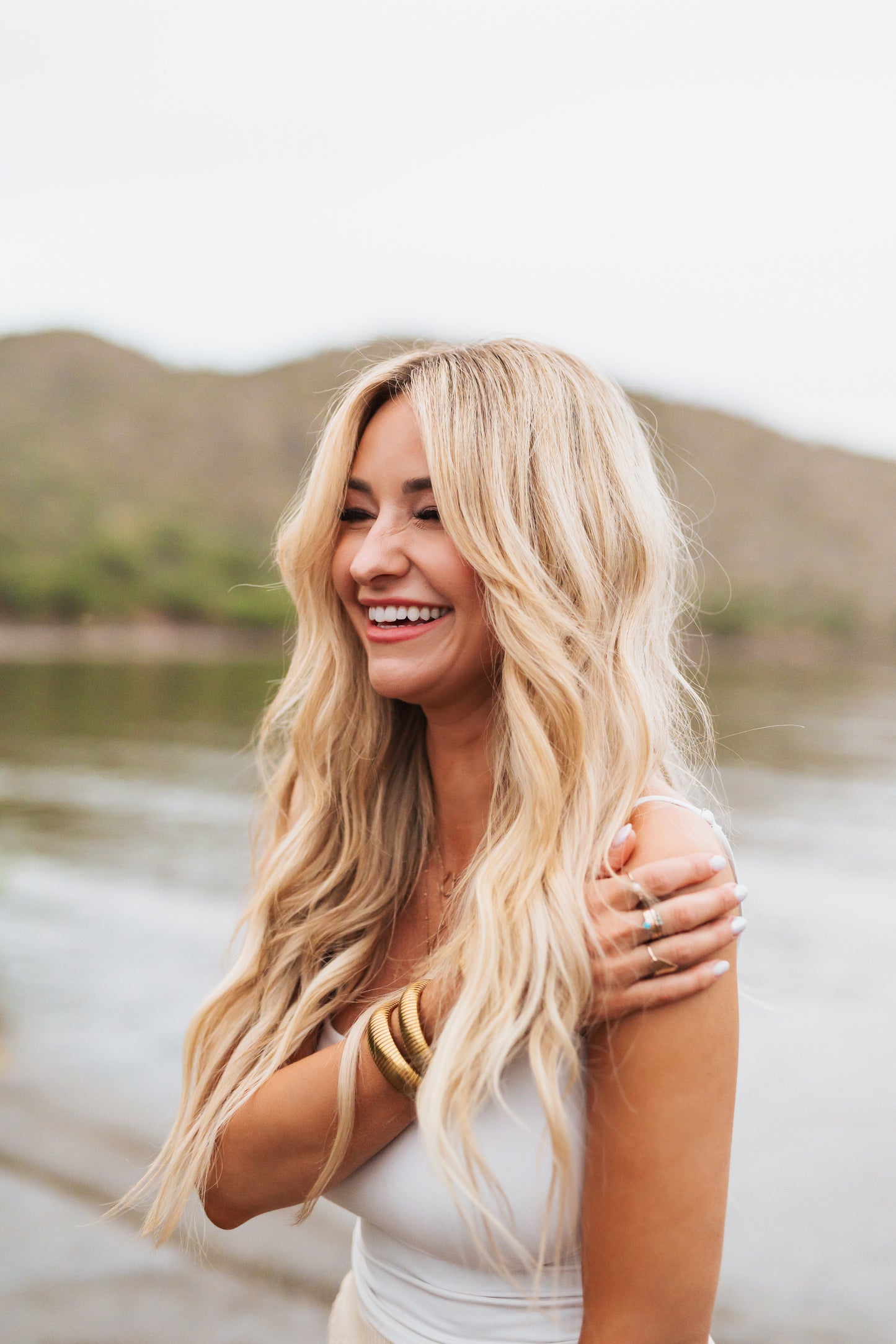 Hampton Hair model wearing a combination of Captain, Hook, and Sailor 22-inch hair extensions.