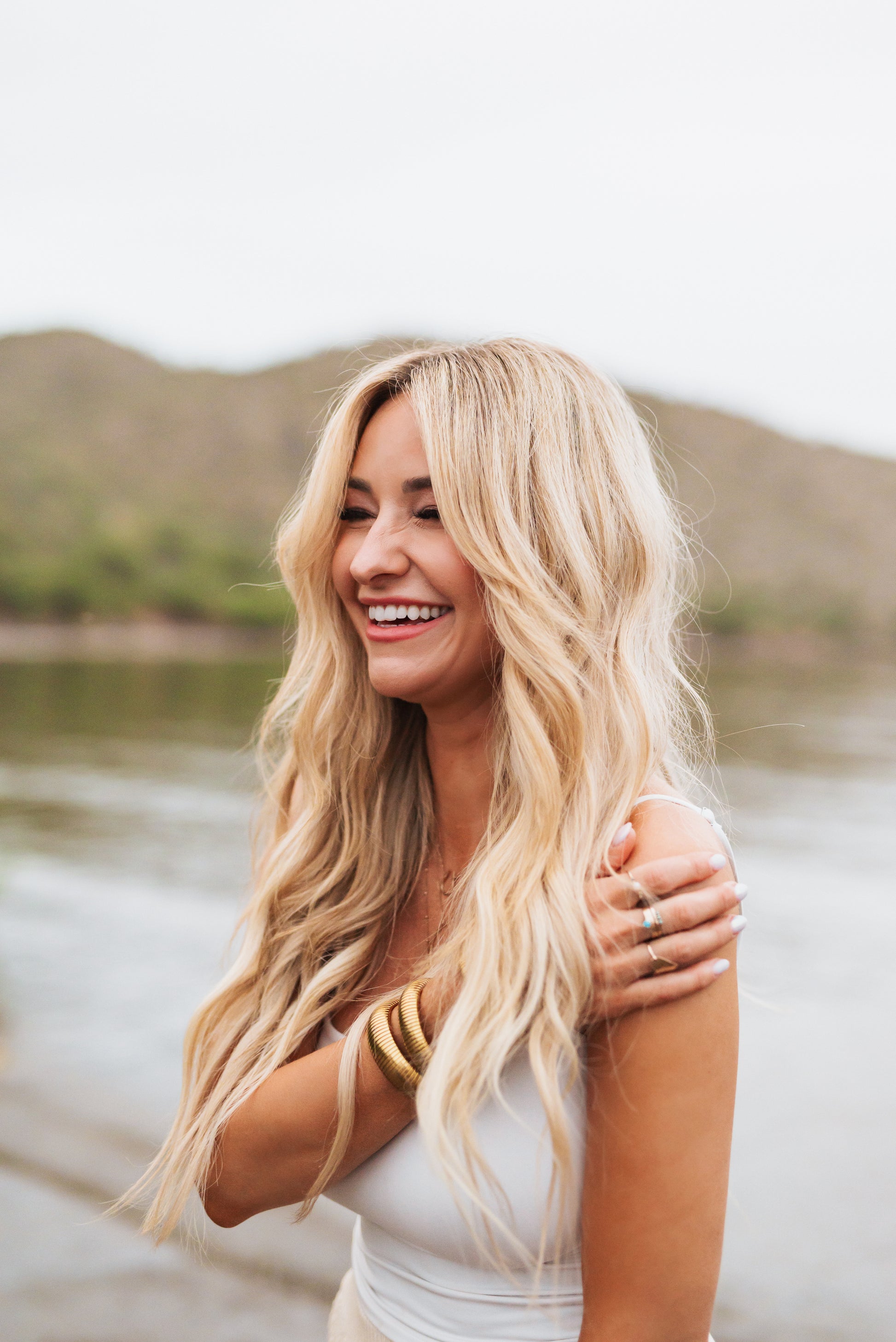 Hampton Hair model wearing a combination of Captain, Hook, and Sailor 22-inch hair extensions.